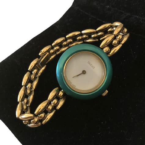 vintage gucci watch with interchangeable bezels